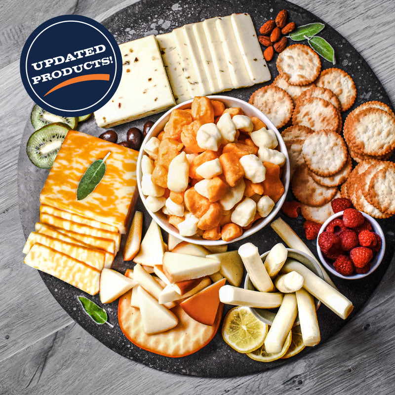 cheese and crackers combo laid out on serving tray