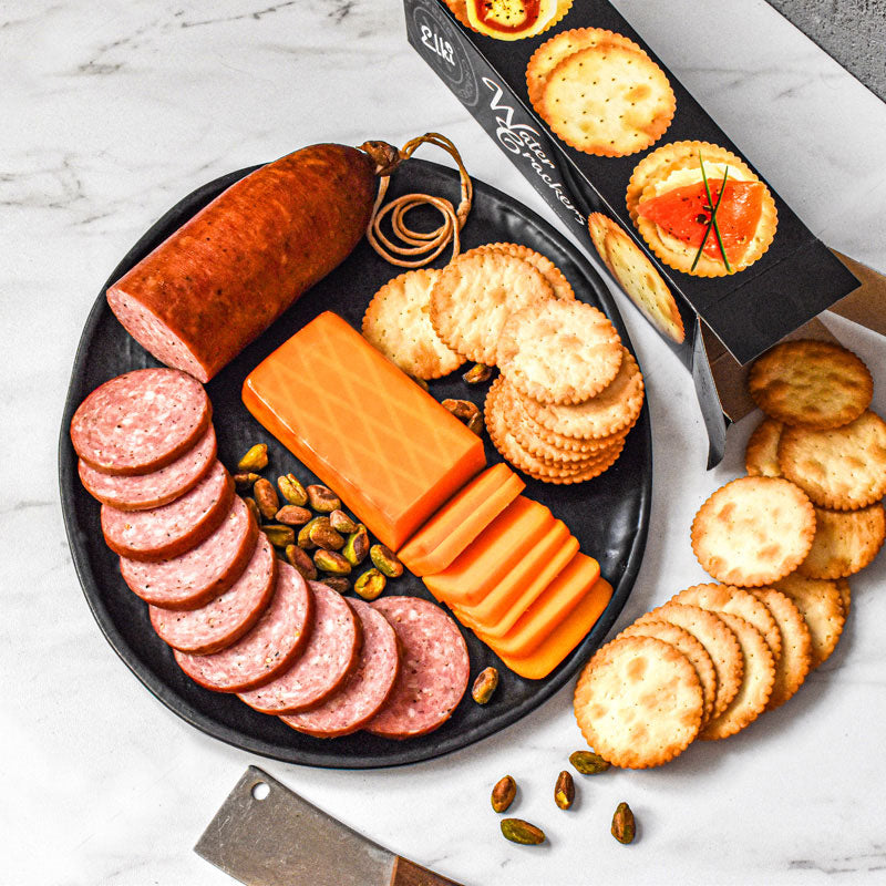 classic smoked duo on a plate with marble backdrop