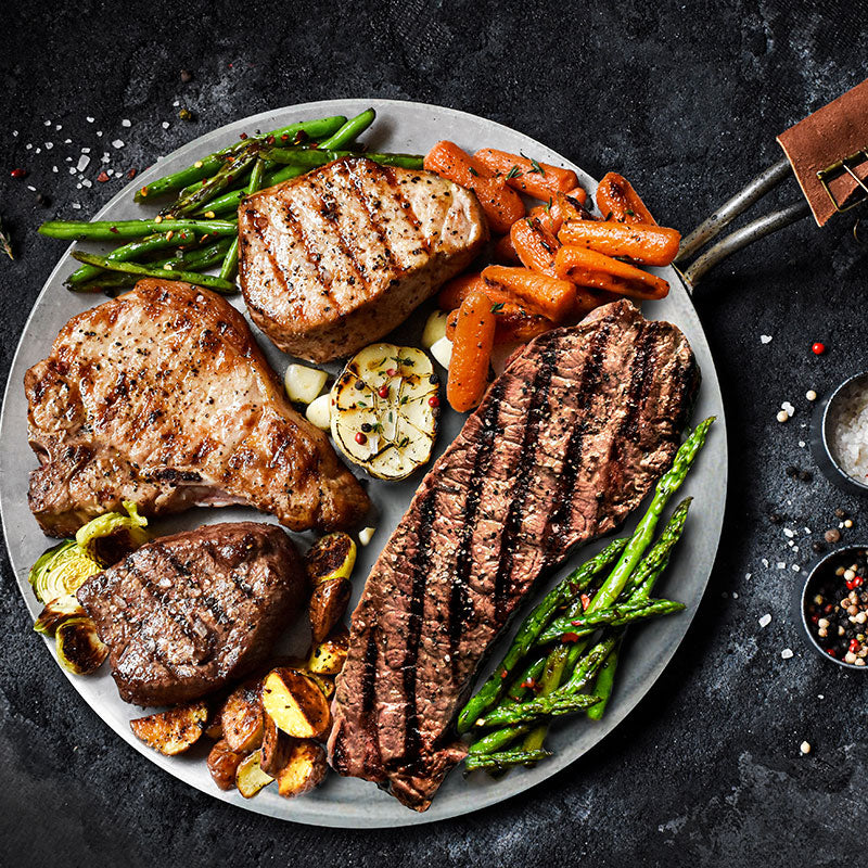 gourmet collection on metal serving tray with vegetables