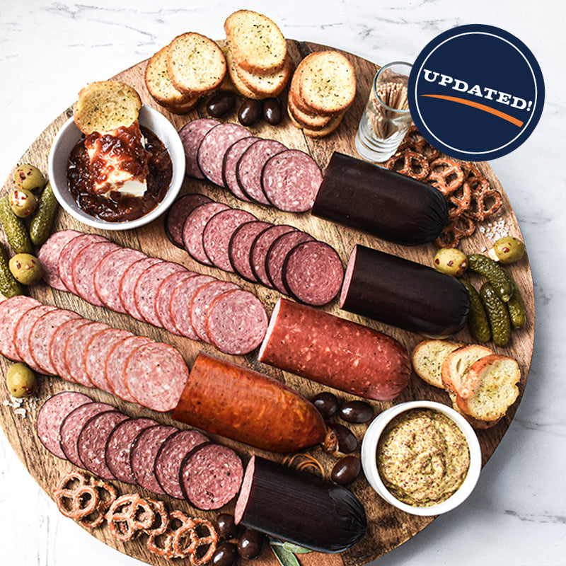 sausage 5 pack sliced and spread out on a wooden serving tray
