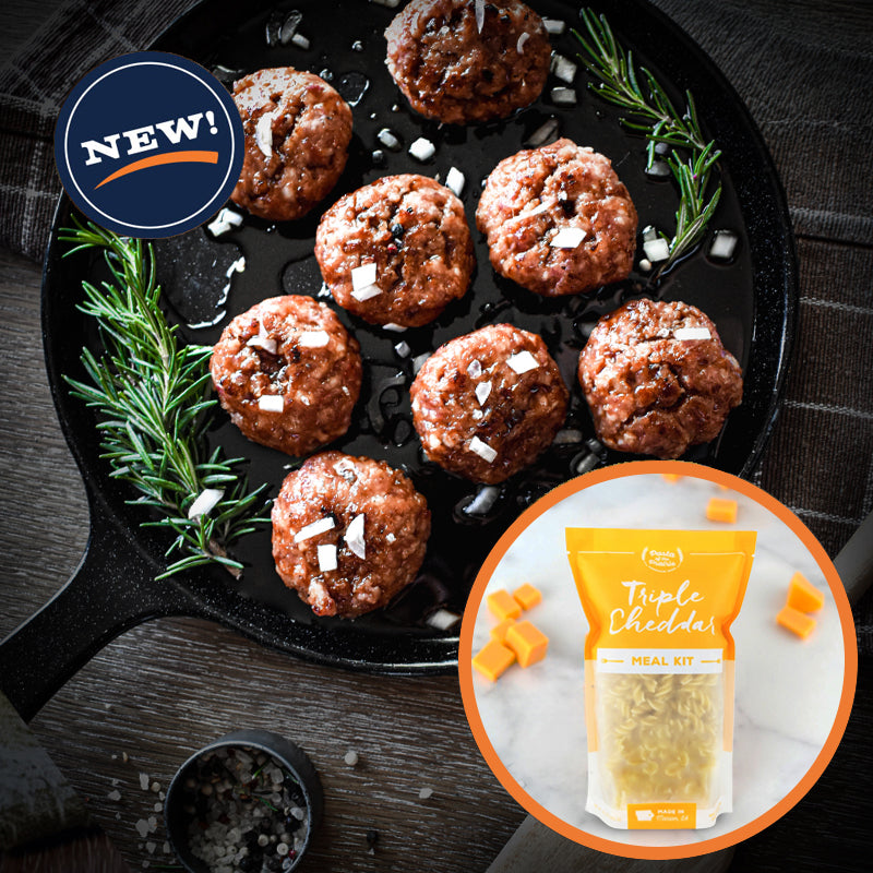 Ham balls being served on a skillet with rosemary garnish and chopped onion. Inset with Pasta of the Prairie Triple Cheddar Meal Kit.