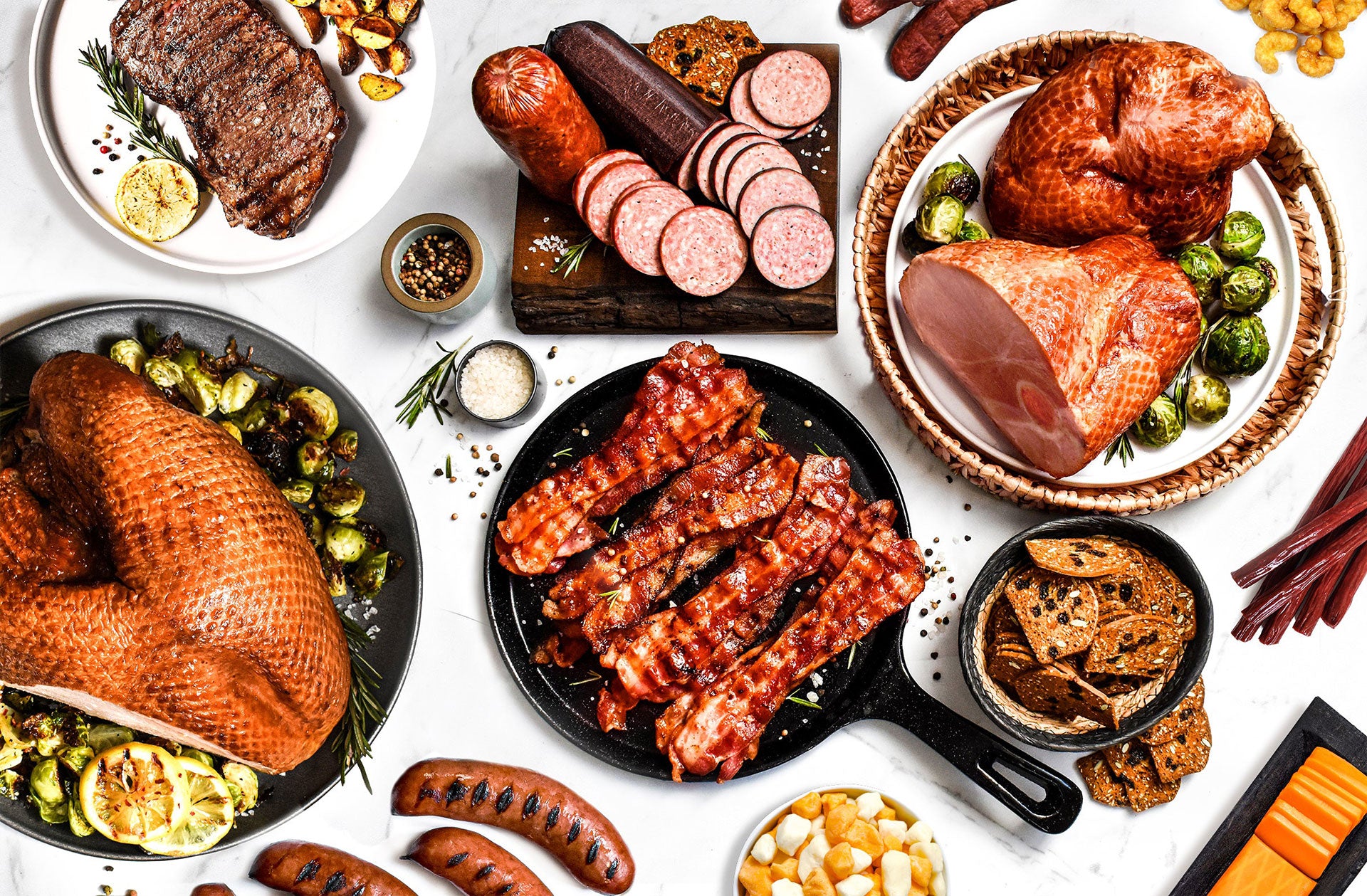 table full of Amana Meat Shop food on plates