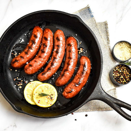 smoked bratwurst in a skillet