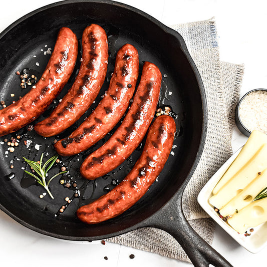 swiss bratwurst in a skillet