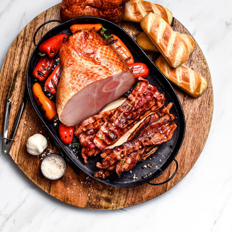 taste of the heartland in a serving tray on a cutting board served with bread