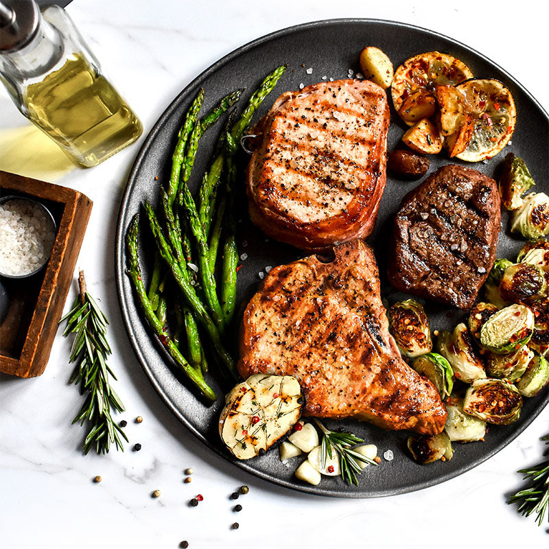 trio for two bundle served on a plate with vegetables